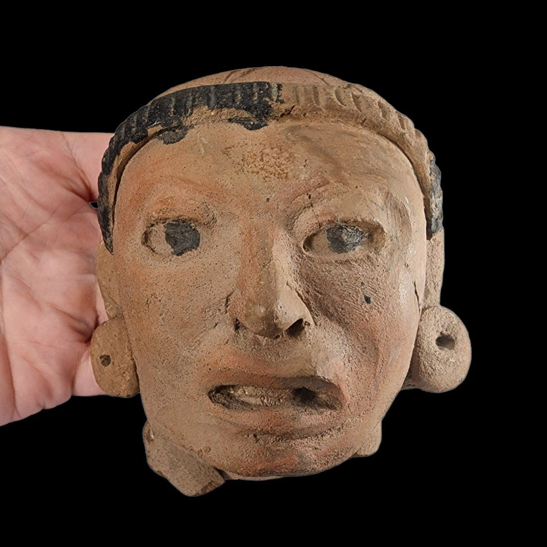 Pre-Columbian Veracruz Head Fragment: Pre-Columbian Veracruz Head Fragment from Mexico, ca. 300-600 CE. Remojadas culture, hollow, mold made earthenware with black (chapapote) paint. In fine condition with minimal repair. 5" in height. Ex