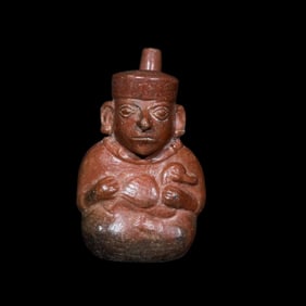 Pre-Columbian Moche V Pottery Vessel Depicting a Man Holding a Duck