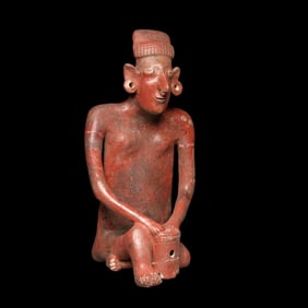 Monumental Pre-Columbian Sheepface drummer figure