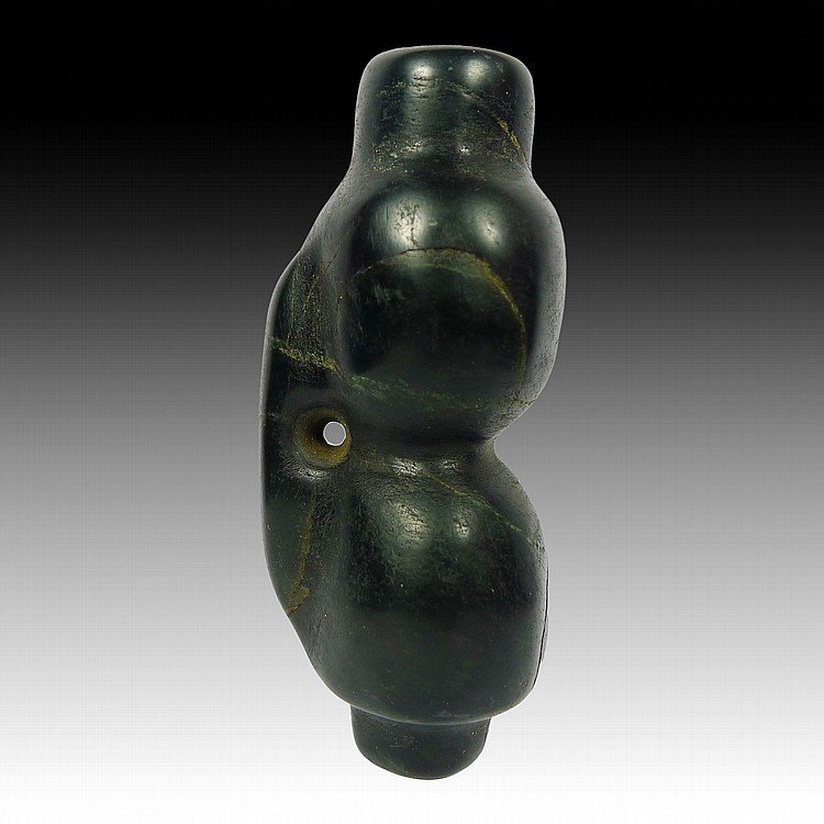 Pre-columbian Mezcala Stone Snuff Tube: Pre-columbian Mezcala Stone Snuff Tube from Mexico, ca 500 B.C. In the form of a skin bag. Laterally drilled all the way through and made from a serpentine stone. 2.75" in length. All lots will be sol
