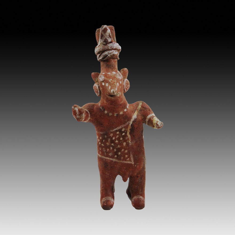 Pre-columbian Sheep-Faced Jalisco Figure: A very nice Pre-columbian Jalisco figure from West Mexico, ca. 100 B.C.-250 A.D. Solid terracotta standing male figure, needle nose type. Depicted with pointy ears and high updo. Painted red-brown sur