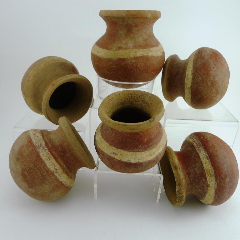 Pre-columbian Collection of Jalisco Ollas: A rare collection of identical Jalisco Ollas from West Mexico, ca. 200 B.C.-300 A.D. All painted with red ground and a simple line of white around the middle of the piece. Total of 6 all found in the 