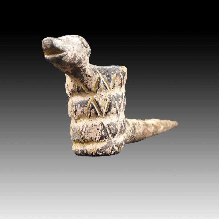 Rare Pre-columbian Tarascan Pottery Pipe: Pre-columbian Tarascan Pipe from Mexico, ca. 1450-1520 A.D. Pipes are some of the scarcest material to find in the Pre-columbian world. There are hardly any authentic pipes around and especially in su
