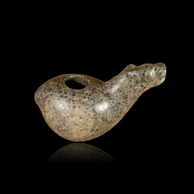 Pre-columbian Inca Stone Canopa: Pre-columbian Inca Stone Canopa from Peru, ca.1200-1400 A.D. A fine Inca 'Canopa' stone effigy. This well formed llama effigy is carved from a beautiful grayish/ beige material with black spotting thr