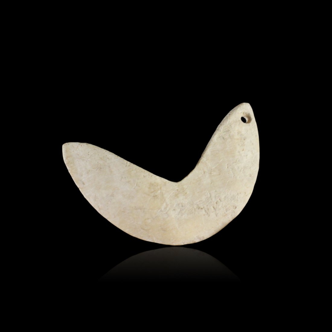 Pre-Columbian Nayarit Shell Claw Shaped Pendant: A large Pre-Columbian shell pendant from the ancient Nayarit region of West Mexico, circa 200 B.C. - 300 A.D. This example is drilled for suspension at one end. The ancient maker crafted this claw sha