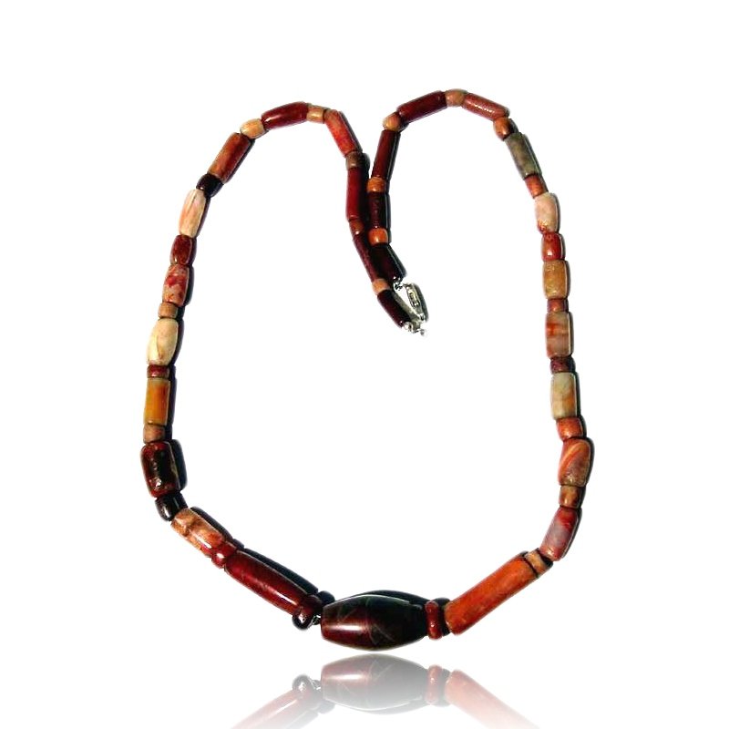 Pre-columbian Tairona Necklace: A lovely Tairona necklace from Colombia, ca. 1000 – 1500 AD. Made from highly polished carnelian beads. A beautiful 1-1/4” long barrel bead is used as a central pendant. Restrung with modern clasp