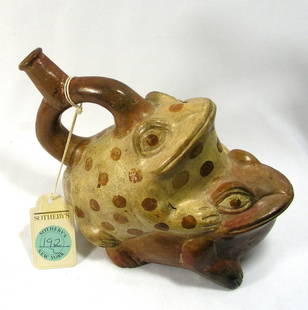 Pre-columbian Moche Copulating Frogs: Pre-columbian Moche frogs from Peru, ca. 200-400 A.D. Depicting two copulating frogs one painted in a brown/red color and the top in cream with brown spots. Beautiful example! 5-7/8" in height.