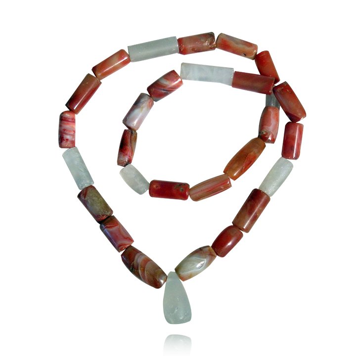 Pre-columbian Tairona Necklace: An excellent Tairona necklace from Colombia, ca. 1000 - 1500 AD. This beautiful piece of jewelry is 24" long and is made from fine carnelian and crystal tubes, setting off a nice crystal tear-drop pen