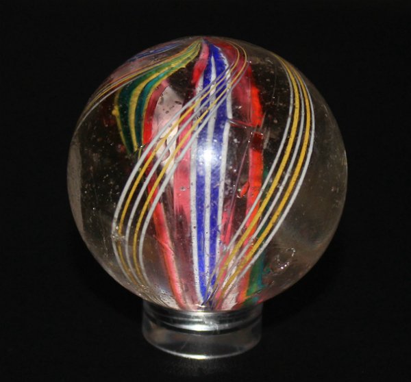Large Antique German Handmade Swirl Marble Divided Core: Large Antique German Handmade Swirl Marble with Divided Core. Measuring 1.40", very nice condition for it's age. Two pontils, one of which is faceted. Some minor flea bites and dings on surface and on