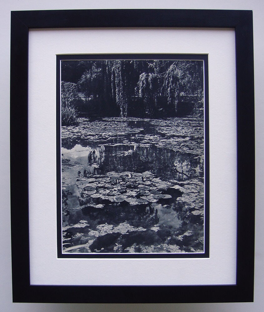 Monet's Garden 1937-1940 Photogravure: Monet's Garden. Antique Photogravure. 1937-1940. Teriade. Draeger Freres. Image size 10 x 13 7/8 inches. Framed dimensions: Approximately 19 x 23 inches. This piece has been professionally matted and 