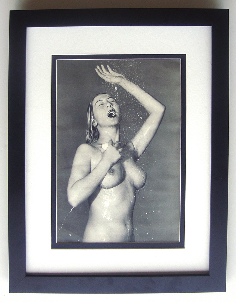 Andre De Dienes Nude photogravure: Andre De Dienes. "Nude." Photogravure, c. 1950. Double matted and framed in contemporary black frame. Framed dimensions 16 x 20 inches. Comes with a Certificate of Authenticity.