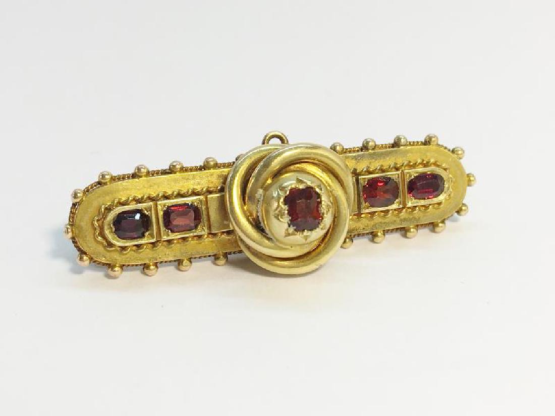 A Victorian Ruby Cannetille Brooch, set in 15ct gold, (1 of 1)