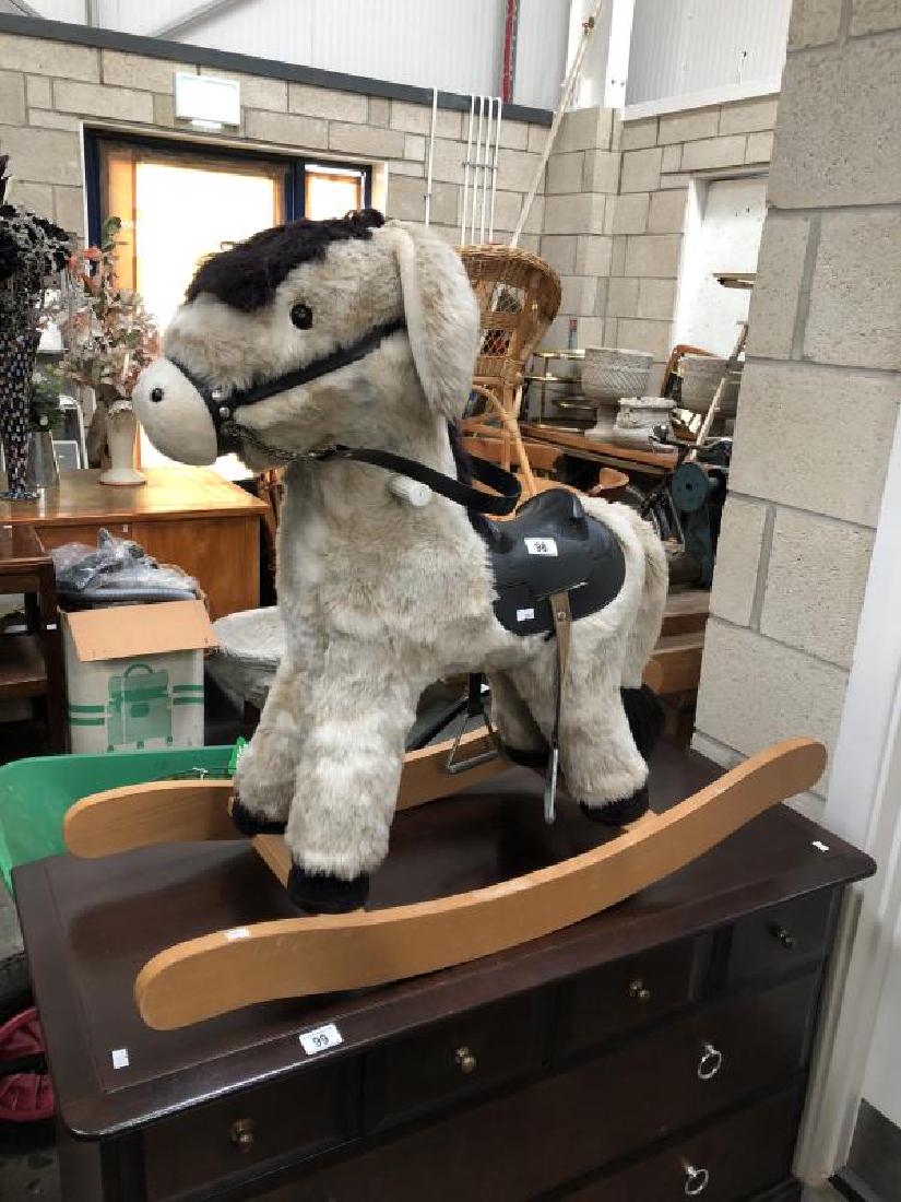 A childs ride on donkey.: A childs ride on donkey.