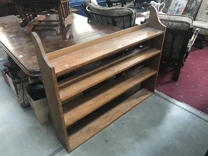 An Edwardian Oak Wall Book Rack.