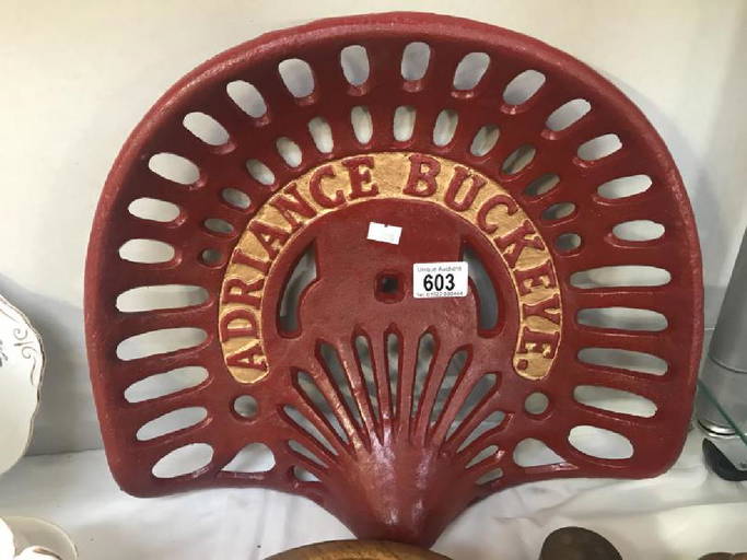 A Cast Iron Adriance Buckeye Tractor Implement Seat.