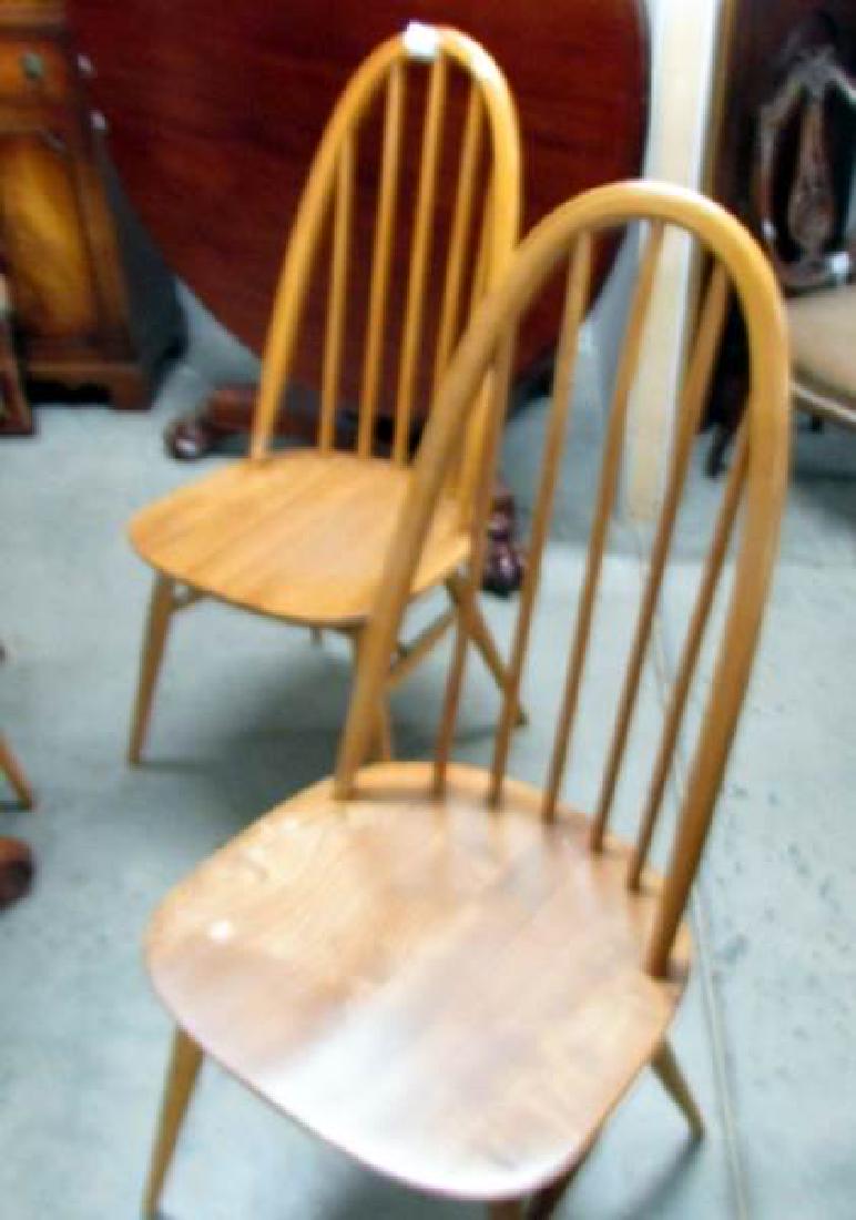A set of 6 light Ercol dining chairs.: A set of 6 light Ercol dining chairs.