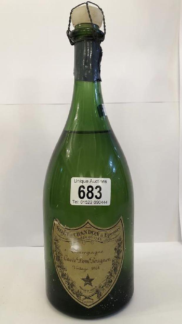 A bottle of Moet Et Chandon A Epernay champagne Cuvee: A bottle of Moet Et Chandon A Epernay champagne Cuvee Dom Perignon vintage 1961