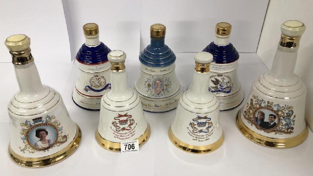 A collection of 7 Royal Commemorative Wade whisky bells: A collection of 7 Royal Commemorative Wade whisky bells (sealed and with contents)
