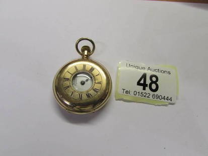 A gold plated pocket watch by the Lancashire Watch Co.: A gold plated pocket watch by the Lancashire Watch Co. (missing one hand).