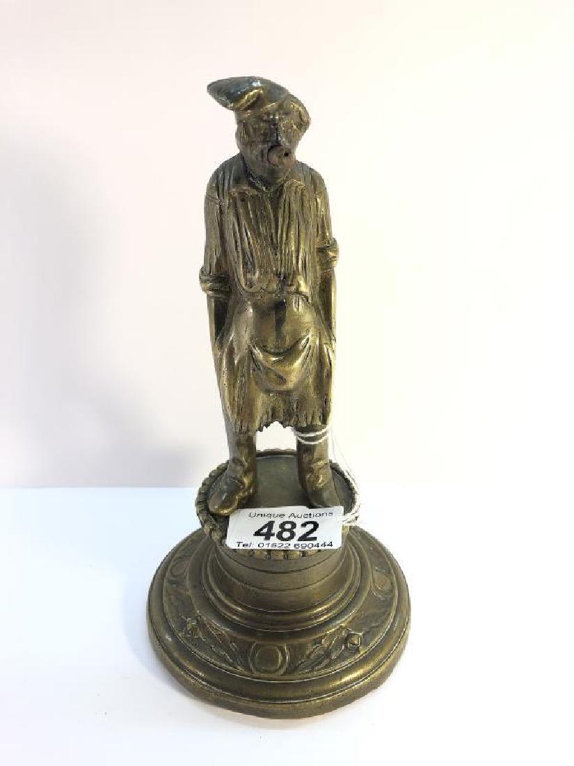 A Victorian brass bar lighter in the form of a brewery: A Victorian brass bar lighter in the form of a brewery dray man.