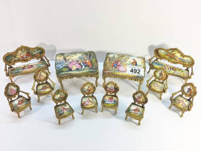 2 sets of Austrian enamel miniature furniture: 2 sets of Austrian enamel miniature furniture comprising 2 sofa's, 4 arm chairs, 4 dining chairs and 2 tables.