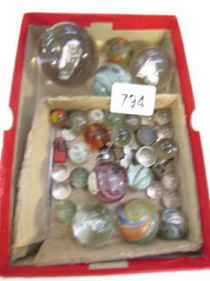 A quantity of marbles including Victorian sulphide of: A quantity of marbles including Victorian sulphide of cow, lion and bear.