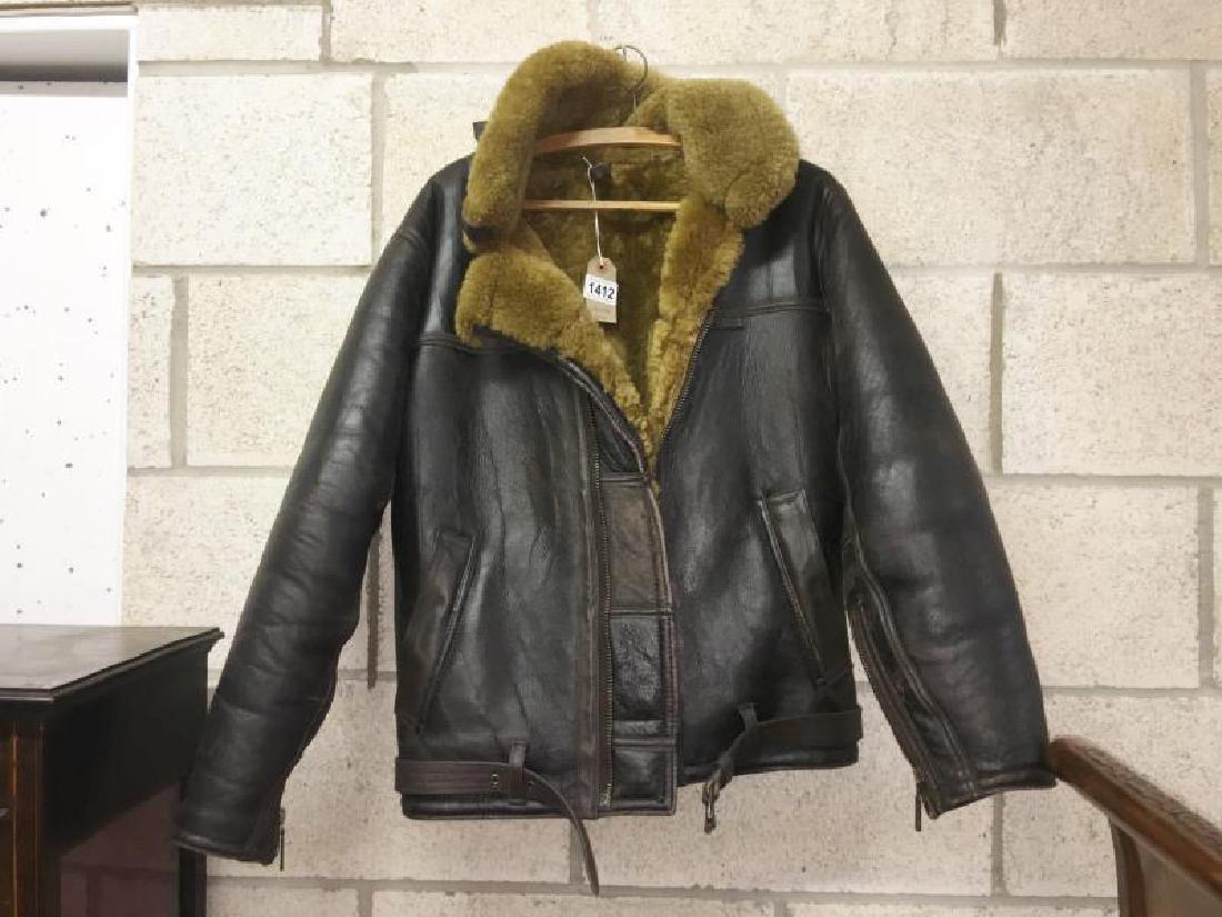 A ladies tailored leather bomber style jacket with: A ladies tailored leather bomber style jacket with sheepskin wool lining to fit size 12 (reputedly made on the Irvin machines)