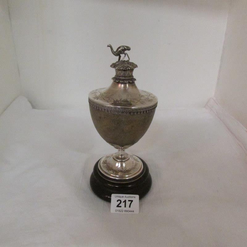 An Early 19th century Emu egg inkwell mounted on silver