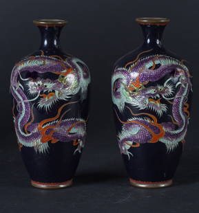 A pair of small cloisonné vases: Japan, 20th century Both are decorated with a dragon on black background. h 12 cm