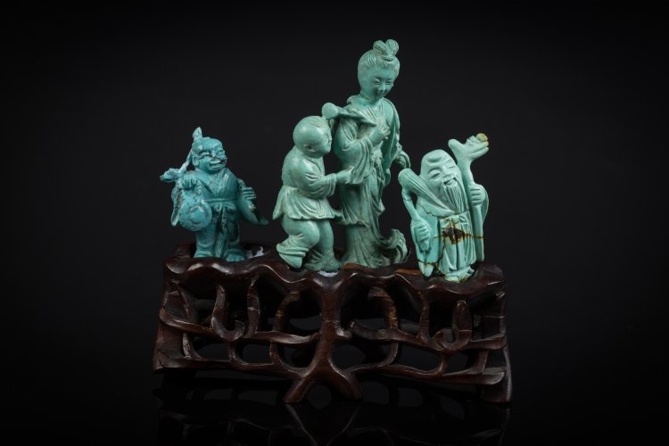 A group of turquoise intaglio carvings: China, 20th Century With bases. l 4 cm