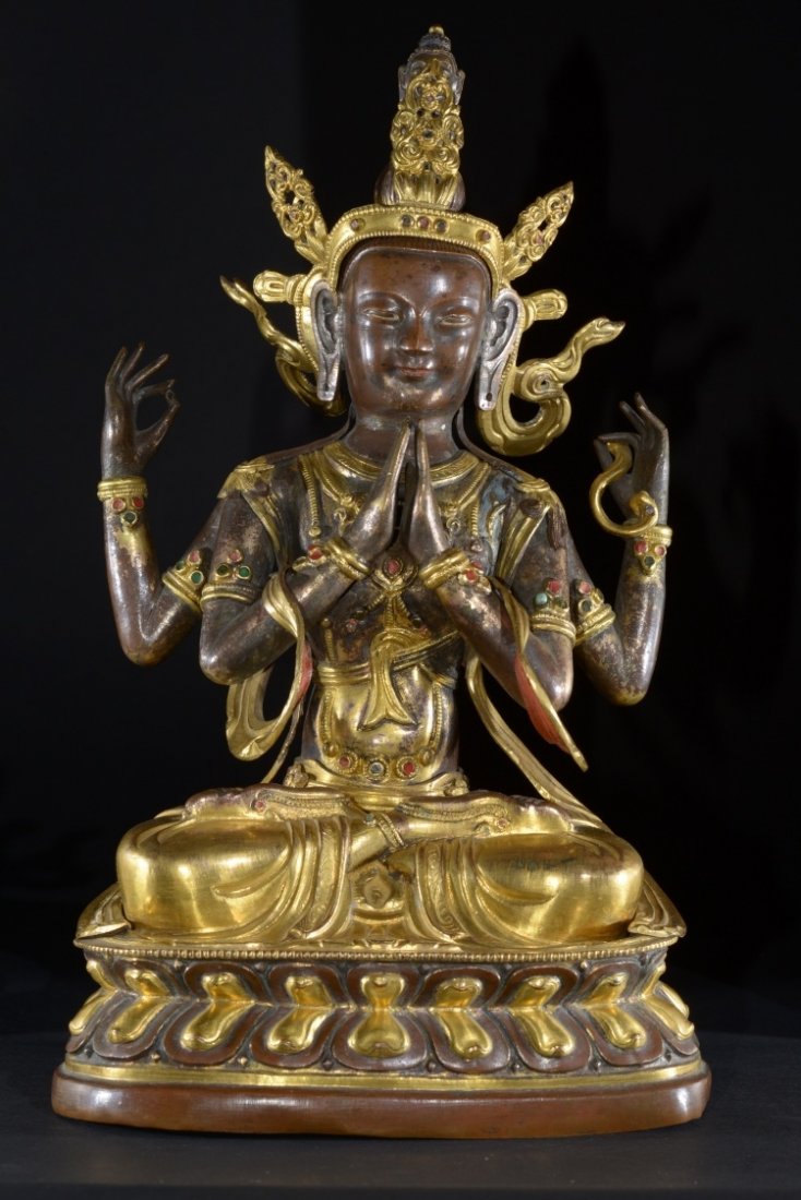 Figure of Bodhisattva Avalokitesvara: China/Mongolia, 18th-19th Century The embossed and gold leaf detail on the dress, jewellery and crown of this statue are superbly executed which depicts the Transcendent Bodhisattva of Compassion Aval