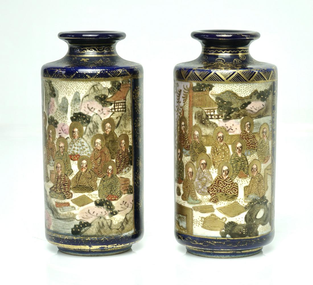A pair of Japanese small Satsuma vases, Meiji period.: The vases decorated with Rakan figures an idyllic landscape on the background and ladies and children all within reserves, the bottoms marked, 9cm height. Provenance: Private collection of Mr. Steven