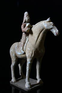 Chinese Large Tang Horse and Musician: Tang dynasty but possibly later. Large terracota horse and musician. Some red pigment still visible. H: 14.5inc (42cm). L: 13inc (32cm). This is from the estate of a reputable British gentleman who wa