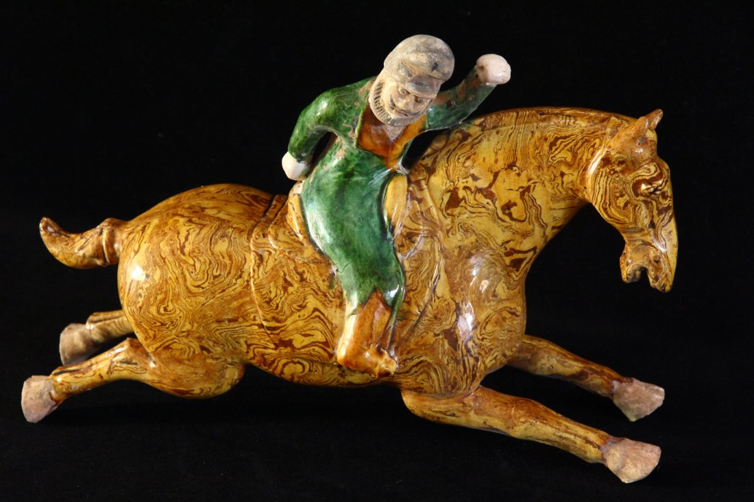 Chinese Large Tang Polo Horse with Player: Tang or later period. Polo horse with player. Hollow and glazed. L: 12.5inc (33cm) H: 9inc (23cm). This is from the estate of a reputable British gentleman who was a collector of Asian antiques. Adqui