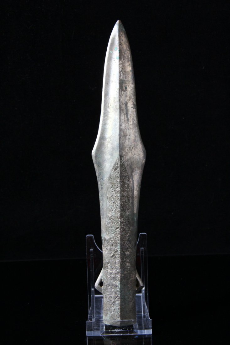 Chinese Large Spear Head: Chinese large spear head. C18th or later. Tinned bronze spear head with intricate geometric lines. Still fairly sharp. L: 10.5inc (26cm). Property of an English gentleman, adquired 1995 in the London 
