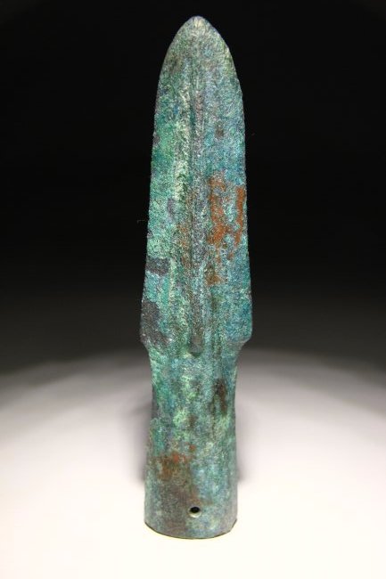 Chinese Warring States Spearhead: Bronze cast slender spearhead with tubular socket and narrow, parallel-sided blade. Lenght: 14cm or 5.5". Weight: 140 grams. Ex UK private collection formed before 1980.