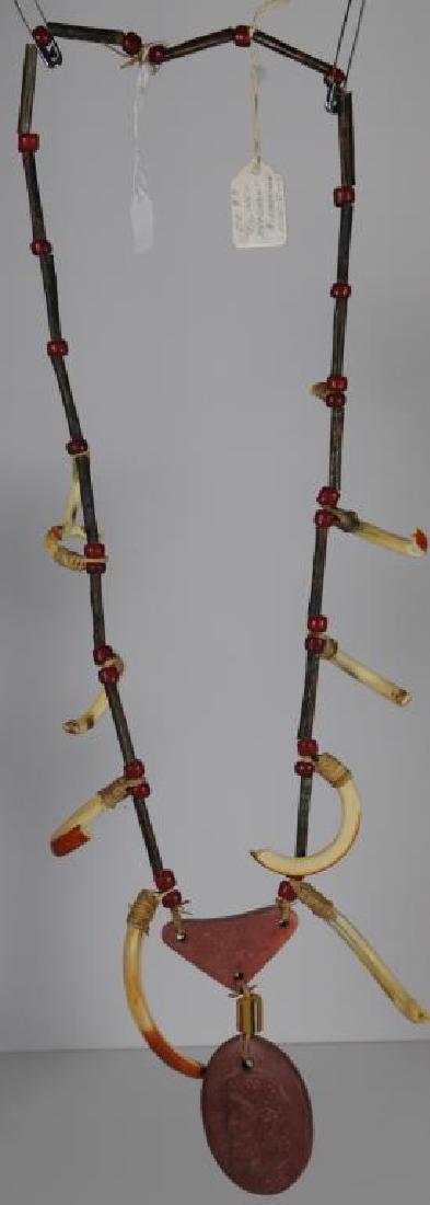 MESQUAKIE NECKLACE SAC & FOX, 38" LONG, COPPER: BEADS, A FEW HUDSON BAY'S, 10 CLAWS OR TEETH UP TO 4" LONG, AND PIPESTONE MEDALLION. GREAT LAKES.
