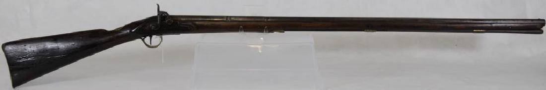 FINE EARLY PERCUSSION 'CHIEF'S GUN' A TREATY GUN,: MORRIS & CO. AS DESCRIBED IN ATTACHED PAMPHLET (I.E., CANADIAN ARMS JOURNAL). NOTE THE SILVER ESCUTCHEON OF AN INDIAN ON WRIST OF GUN. 52" L OVERALL. BARREL: PART OCTAGONAL WITH BAND, ROUND WITH BAND,