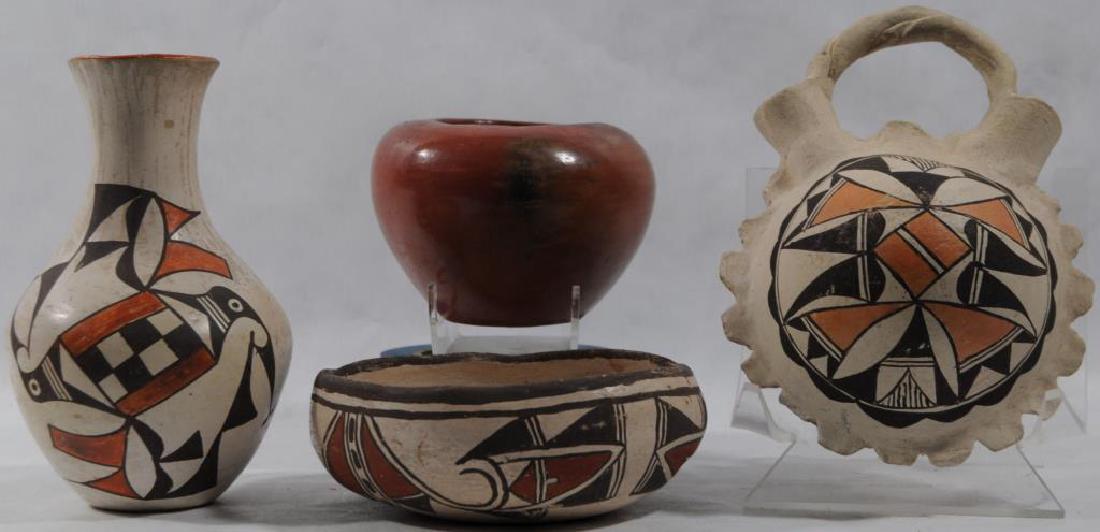 4 PIECES SOUTHWEST POTTERY TO INCLUDE ZUNI PUEBLO: BOWL, HAND FORMED, PAINTING IS TYPICAL OF EARLY ZUNI POTTERY, DESIGN IS FREE HAND AND SOMEWHAT CRUDE, CA. 1900 OR EARLIER, 6 1/4" W X 2 1/4" H. ACOMA VASE WITH PARROT DESIGN, SIGNED ON BOTTOM N. MEX A