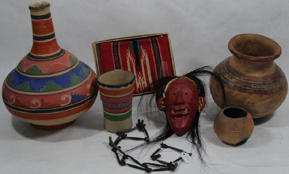 LOT OF MISC. ITEMS TO INCLUDE: CARIB INDIAN PRE-COLUMBIAN POT 7" H, STRAND OF PERUVIAN TALKING BEADS 30" L, CHIMAYO PURSE IN ORIGINAL BOX 5" H, CHEROKE POT MADE ELIZ JACKSON 2 1/2" H, MINI FALSE FACE MASK 5 1/2" H, MEXICAN WATER BO