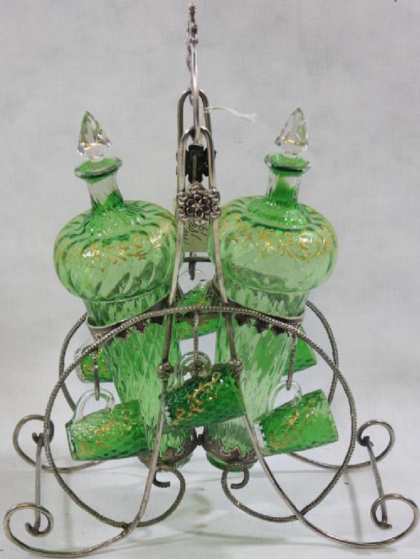 LATE 19TH C. MOSER TYPE 2 BOTTLE CORDIAL SET W/: SILVER PLATED RACK, BLOWN GREEN GLASS W/ GILT ENAMELED DECORATION, 13" H X 9 1/2" W X 4 1/4" D, NO DAMAGE
