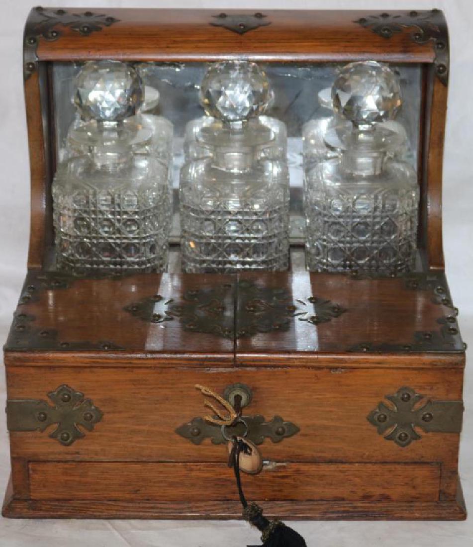 19TH C. OAK TANTALUS, W/ BRASS MOUNTS, 3 CUT (1 of 3)