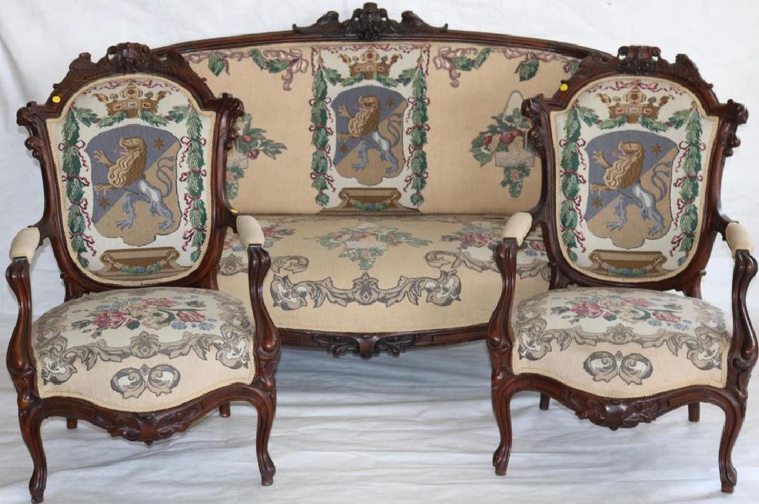 ORNATELY CARVED 3 PIECE ROSEWOOD PARLOR SET W/: UNUSUAL CARVED WINGED CREST, FRUIT CARVING, AND ORNATELY CARVED FEET, SOFA IS APPROX. 42" X 65" X 27", CHAIRS 39 1/2" X 25" X 23 1/2" GOOD OVERALL CONDITION, SHOWS SOME REPAIRS