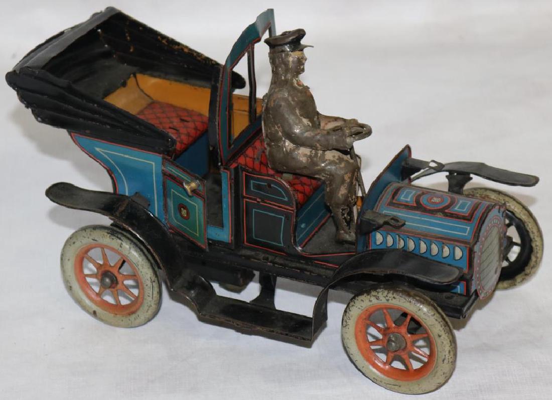 EARLY 20TH C. LITHO TIN, WIND UP CAR W/ DRIVER,: CURRENTLY NOT WORKING, PASSENGER MISSING, APPROX. 9" X 4 1/2" X 5 1/2"