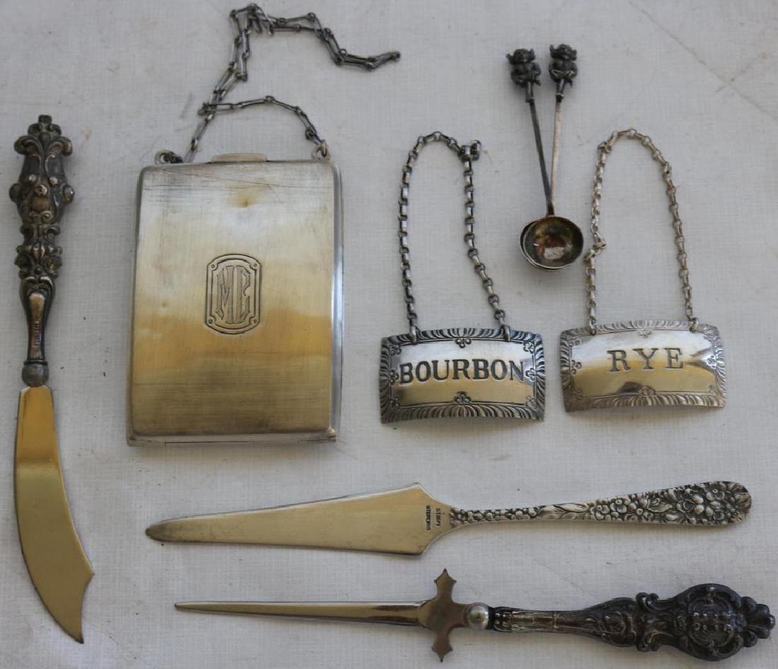 LOT OF 8 STERLING ITEMS TO INCLUDE BOTTLE: TAGS, COMPACT W/ MIRROR, 2 GREMLIN SPOONS, STIEFF REPOUSSE OPENER, 2 SILVER HANDLED OPENERS, 5.1 WEIGHABLE OZ. INCLUDES MIRROR IN COMPACT PLUS 2 HANDLES