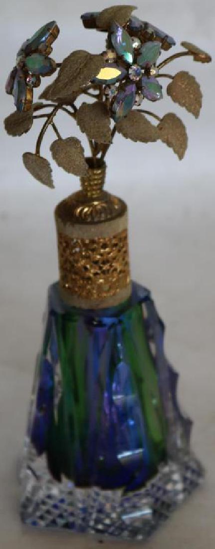 BLUE IRIDESCENT CUT GLASS PERFUME BOTTLE: WITH FLORAL TOP, 8" H