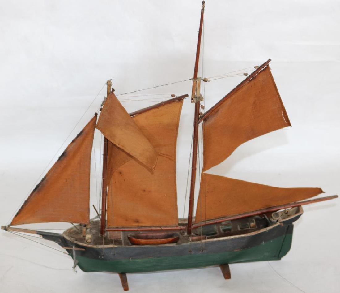SMALL LATE 19TH C. BOAT MODEL: WITH CARVED & PAINTED CAPTAIN, CLOTH SAILS, 14 1/2" H, 17 1/2" L