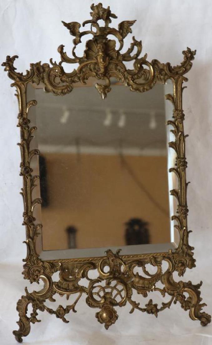 EXCEPTIONAL QUALITY GILT IRON TABLE MIRROR W/: BEVELED GLASS, WING TOP W/CHERUB, APPROX. 21 3/4" X 13 1/4" ORIGINAL CONDITION