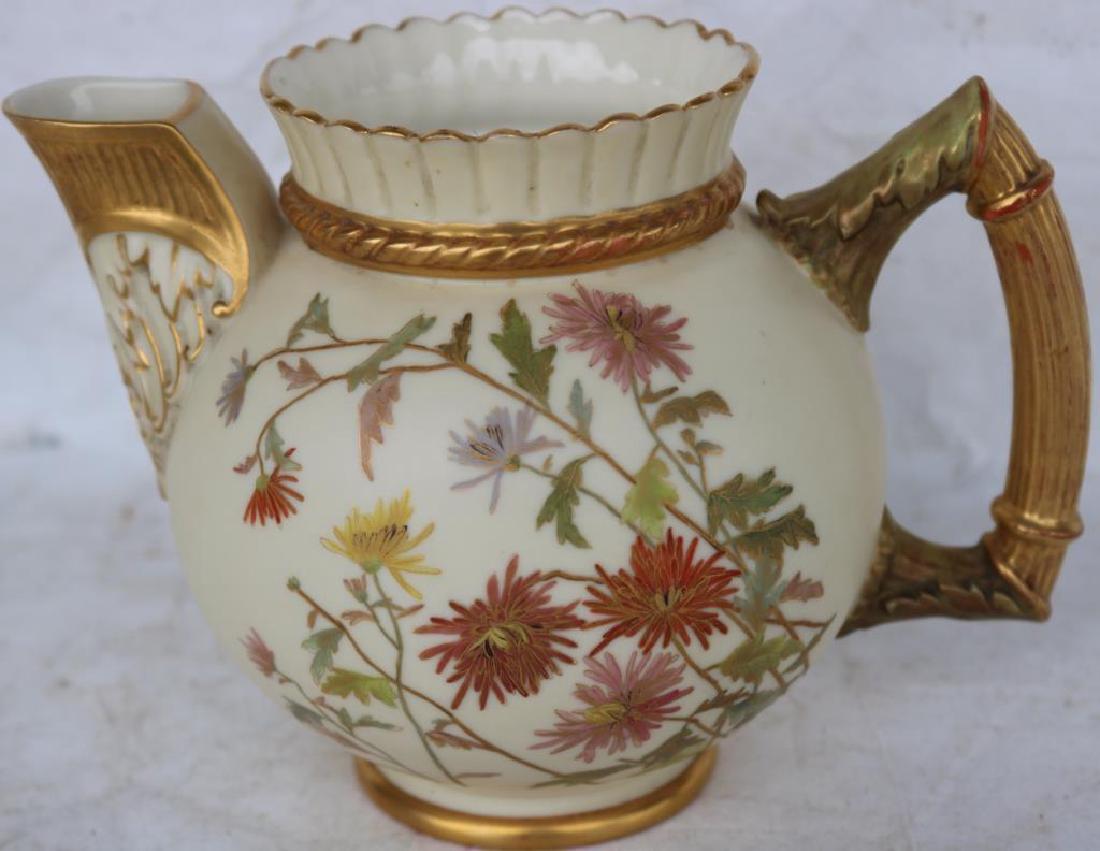 ROYAL WORCESTER HANDLED PITCHER, GOLD GILT W/: FLORAL DECORATIONS 5 1/2"H X 7 1/2"W X 5" DIAMETER