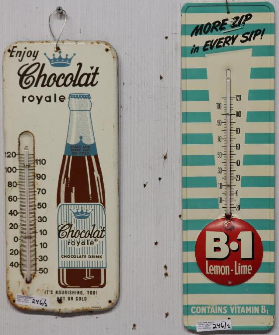 2 LITHO TIN THERMOMETERS, CHOCOLATE ROYALE: CHOCOLATE DRINK, 13 1/2"H X 5 3/4"W AND B.1 LEMON LIME 16 1/4"H X 4 5/8"W, BOTH GLASS INTACT
